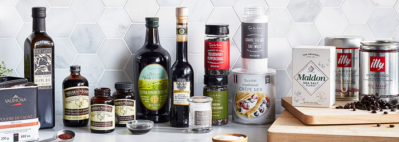 pantry essentials olive oil, pasta, sesonings and vanilla