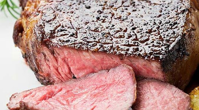 NEW YORK STEAKS WITH CHIVE BUTTER AND MERLOT SAUCE